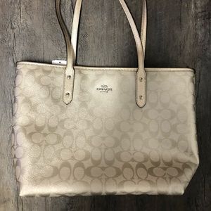 Brand new, platinum coach purse